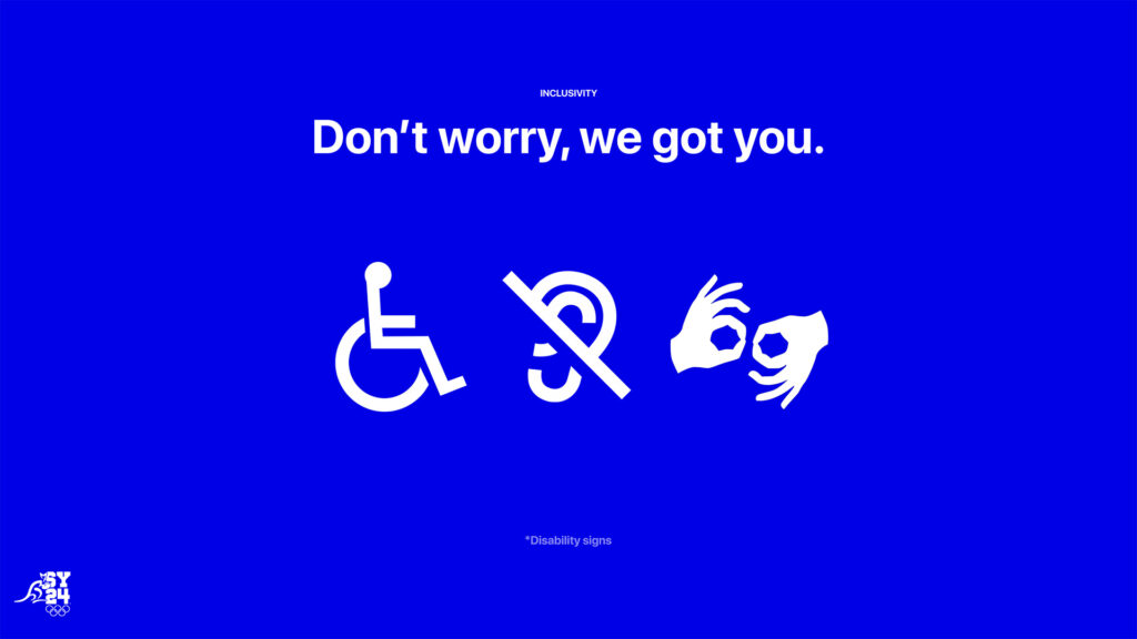 Visuel sur fond bleu vif avec le message rassurant « Ne vous inquiétez pas, nous sommes là pour vous. » écrit en blanc. Au centre, trois pictogrammes blancs symbolisent l'accessibilité : un fauteuil roulant, une oreille barrée (handicap auditif) et des mains pratiquant la langue des signes. Le logo SYD24 apparaît discrètement dans le coin inférieur gauche.
