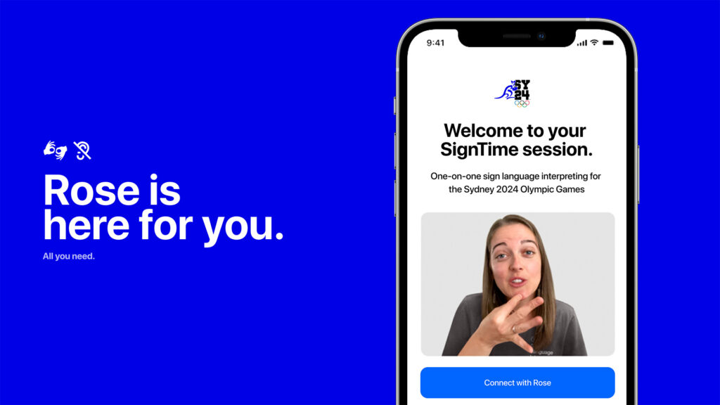 Présentation du service « SignTime » pour les JO de Sydney 2024. À gauche, sur fond bleu, le texte « Rose est là pour vous ». À droite, un smartphone affiche une session d'interprétation en direct avec une femme pratiquant la langue des signes. Un bouton bleu en bas de l'écran indique « Se connecter avec Rose ».
