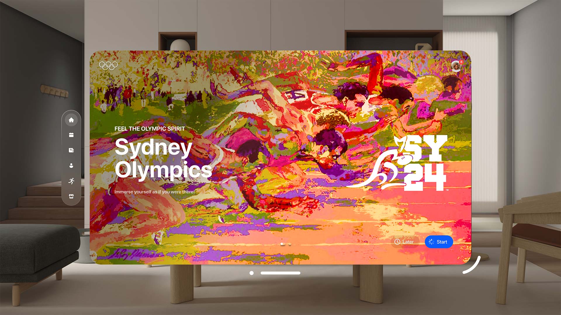 Capture d'écran d'une application de réalité virtuelle affichée dans un salon moderne. L'écran central présente une image de fond colorée de coureurs olympiques. Le texte « Sydney Olympics » et le logo SYD24 s'affichent en blanc sur l'image, accompagnés de boutons de navigation et d'un menu latéral transparent.